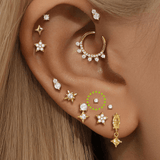 Isabela – Gold earrings with an elegant and fluid design.