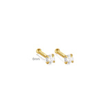 Isabela – Gold earrings with an elegant and fluid design.