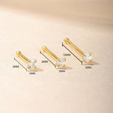 Isabela – Gold earrings with an elegant and fluid design.