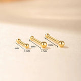 Isabela – Gold earrings with an elegant and fluid design.