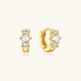 Frieda – Elegant gold earrings with a fun twist.