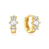 Frieda – Elegant gold earrings with a fun twist.