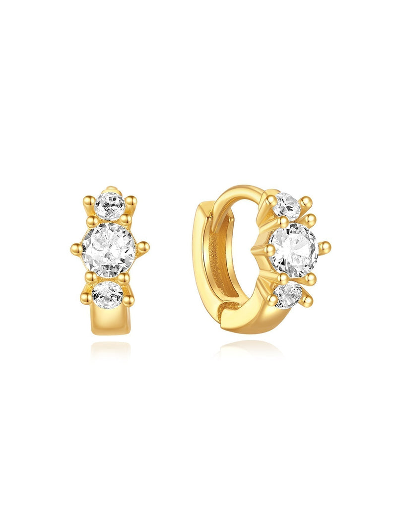 Frieda – Elegant gold earrings with a fun twist.