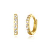 Nora – Elegant gold earrings with a transparent design.