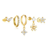 Nora – Elegant gold earrings with a transparent design.