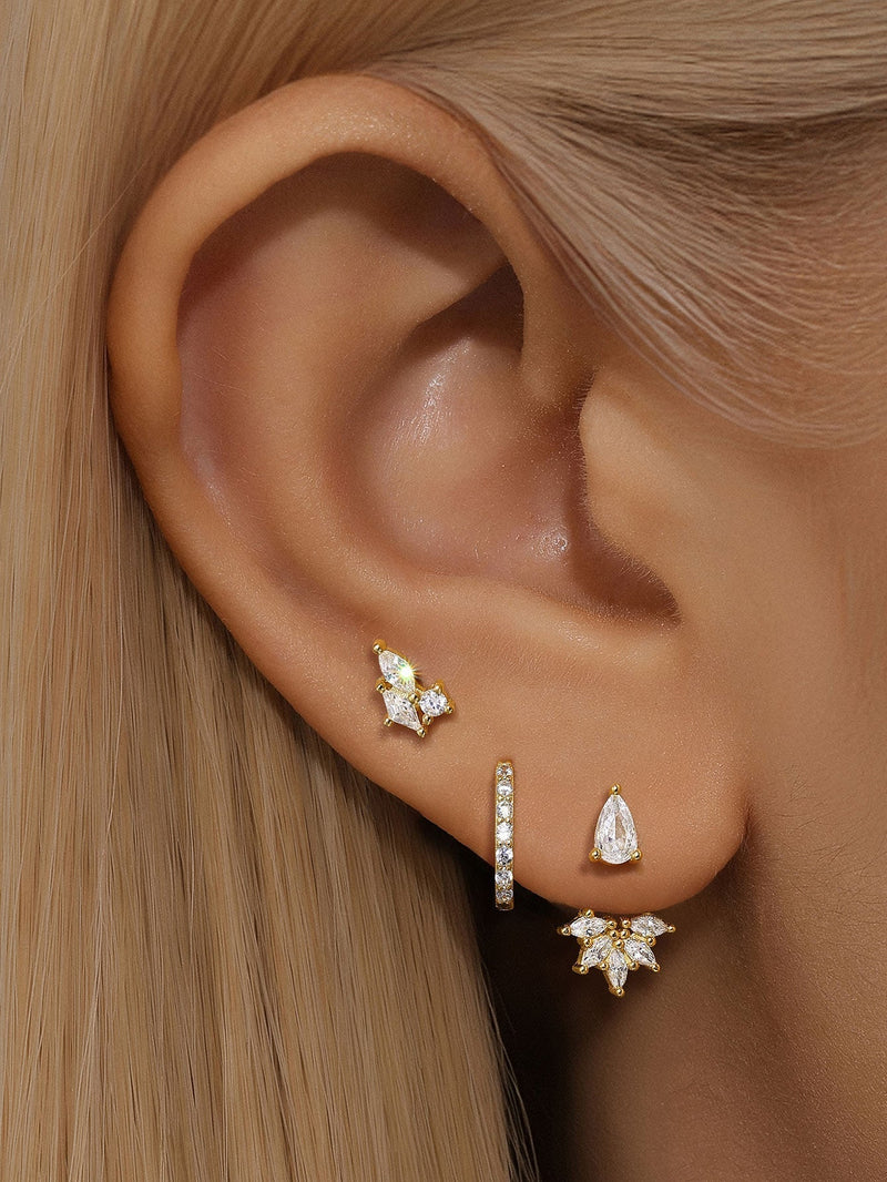 Magda – Delicate gold earrings with a soft shimmer.
