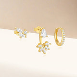 Magda – Delicate gold earrings with a soft shimmer.