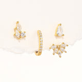 Magda – Delicate gold earrings with a soft shimmer.