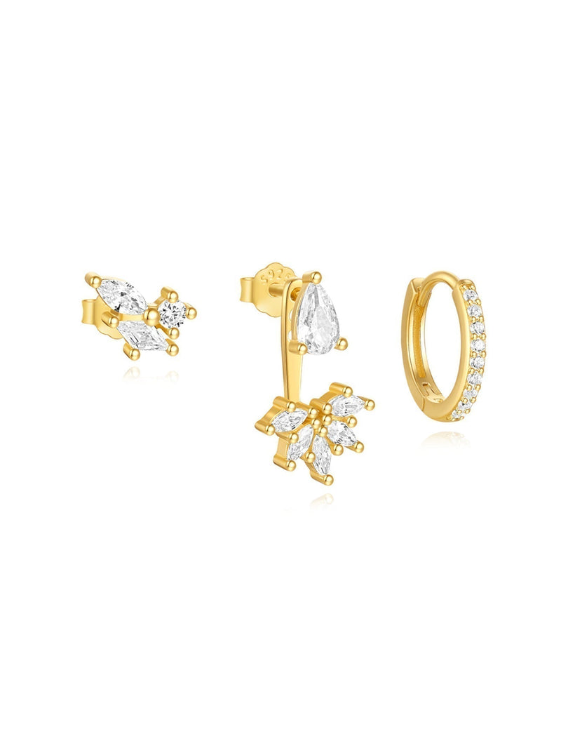 Magda – Delicate gold earrings with a soft shimmer.