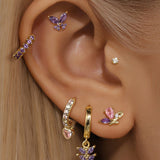 Greta – Elegant gold earrings with subtle movement.