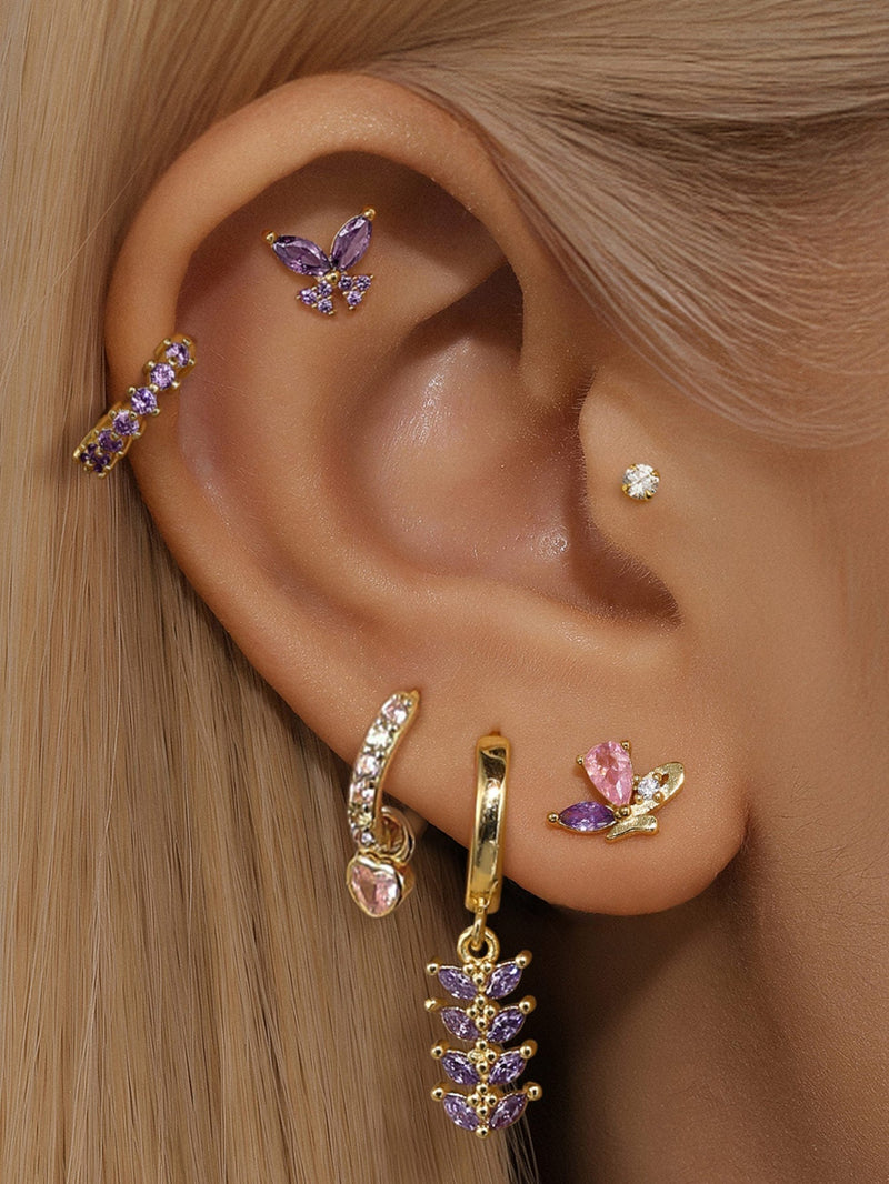 Greta – Elegant gold earrings with subtle movement.