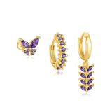 Greta – Elegant gold earrings with subtle movement.
