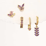 Greta – Elegant gold earrings with subtle movement.