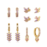 Greta – Elegant gold earrings with subtle movement.