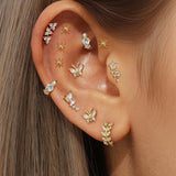 Františka – Gold earrings with a subtle glow.