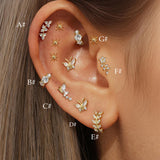 Františka – Gold earrings with a subtle glow.