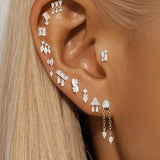 Gold earrings with elegant curved design