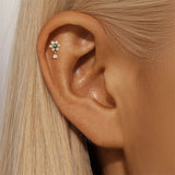 Romina – Gold earrings with a charming playful touch.
