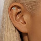 Romina – Gold earrings with a charming playful touch.