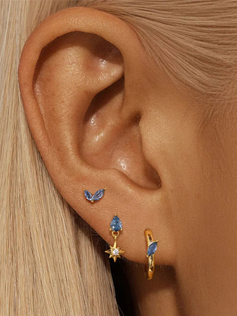 Petra – Elegant gold earrings with organic design.