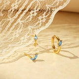 Petra – Elegant gold earrings with organic design.