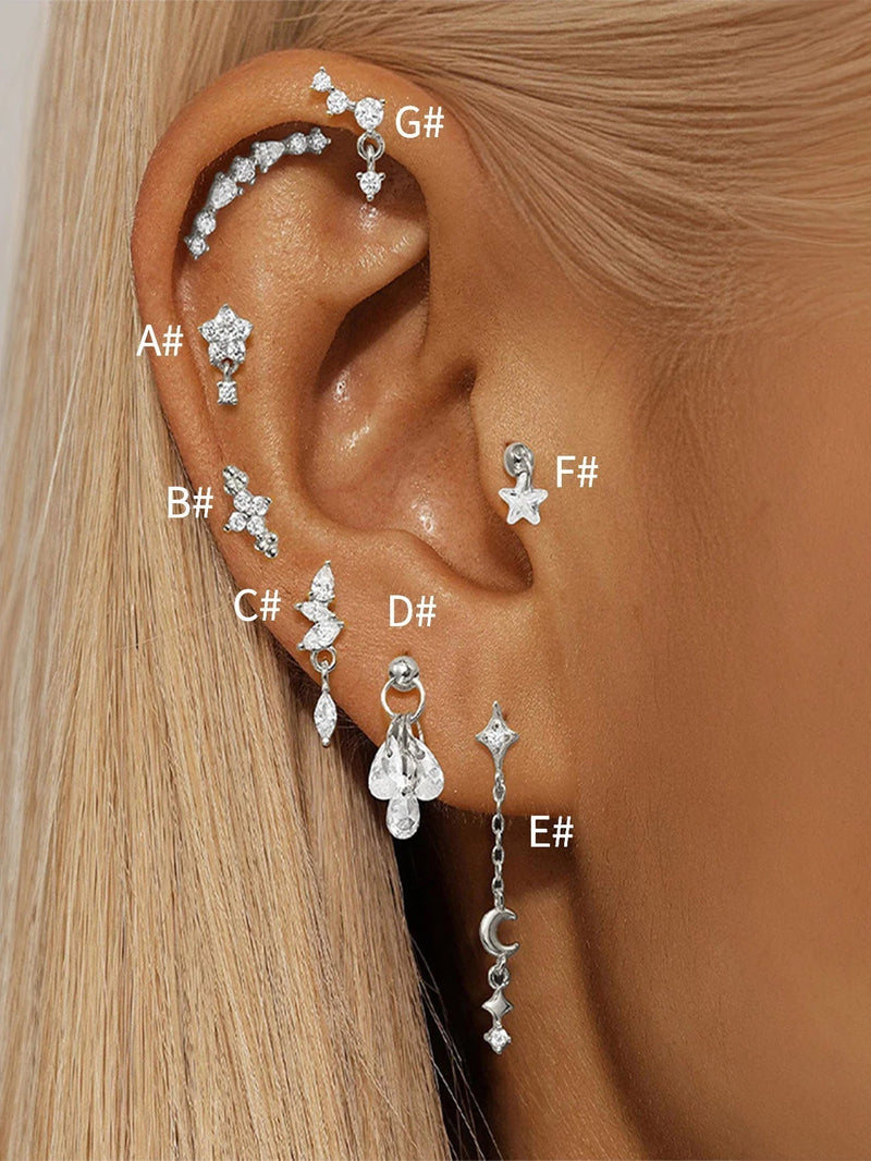 Selina – Elegant gold earrings with a mobile design.