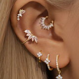 Alena – Delicate gold earrings with a touch of subtle elegance.