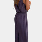 Donatila Unique Jumpsuit with Golden Details and Open Leg