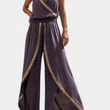 Donatila Unique Jumpsuit with Golden Details and Open Leg