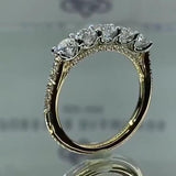 Amélie – Elegant diamond ring with crown design.