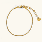 Carina – Gold bracelet with polished platinum finish.