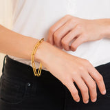 Anna – Gold bracelet with layered design.