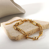 Marisa – Gold bracelet with an elegant double structure design.