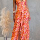Maxi cami dress with open back, cutouts, floral print, ruffle, and side slit