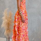 Maxi cami dress with open back, cutouts, floral print, ruffle, and side slit