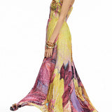 Maxi pleated dress with thin straps, floral print, and fitted waist