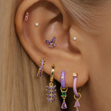Isabela – Elegant gold earrings with geometric design.