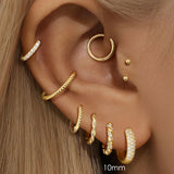 Sina – Gold earrings with a touch of minimalist elegance.