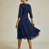 Midi dress with lace and three-quarter sleeves