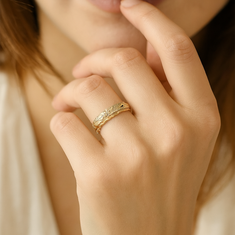 Golden ring with vintage floral design