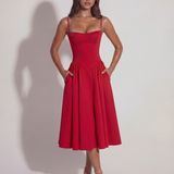 Midi dress with corset and flowing skirt