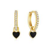 Theresia – Gold earrings with elegant curve.