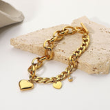 Francis – Gold bracelet with large round links.
