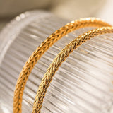 Kateřina – Elegant gold bracelet with minimalist design.