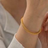 Kateřina – Elegant gold bracelet with minimalist design.