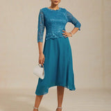 Midi dress with lace and three-quarter sleeves