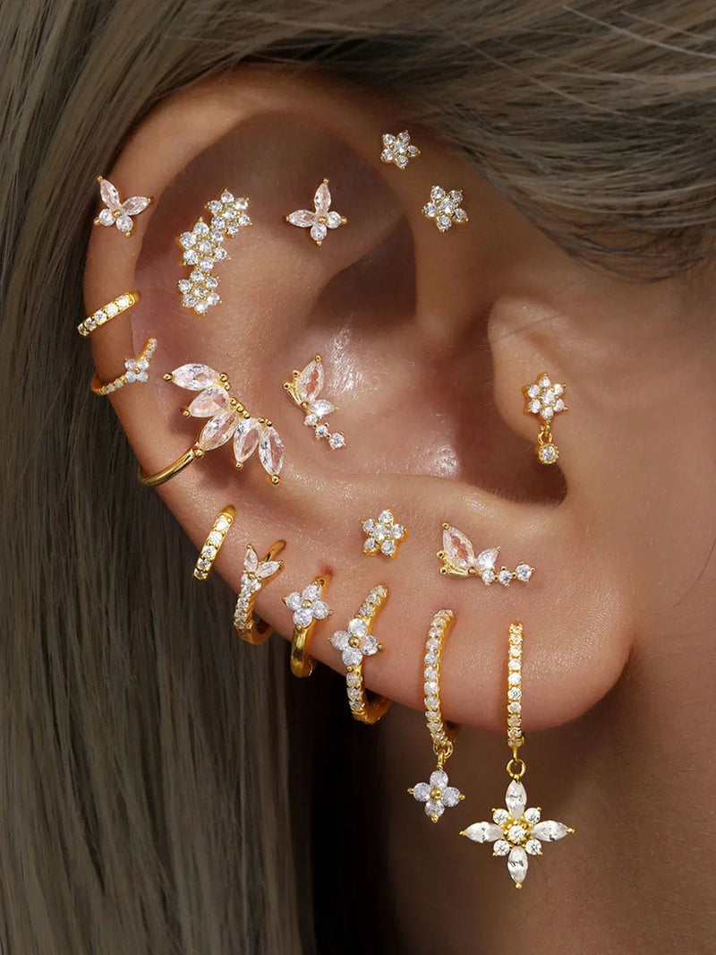 Eva-Marie – Elegant gold earrings with a fluid design.