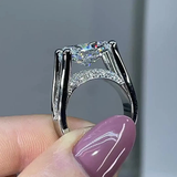 Victoria – Radiant ring with side embellishments.