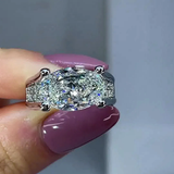 Victoria – Radiant ring with side embellishments.