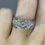 Victoria – Radiant ring with side embellishments.